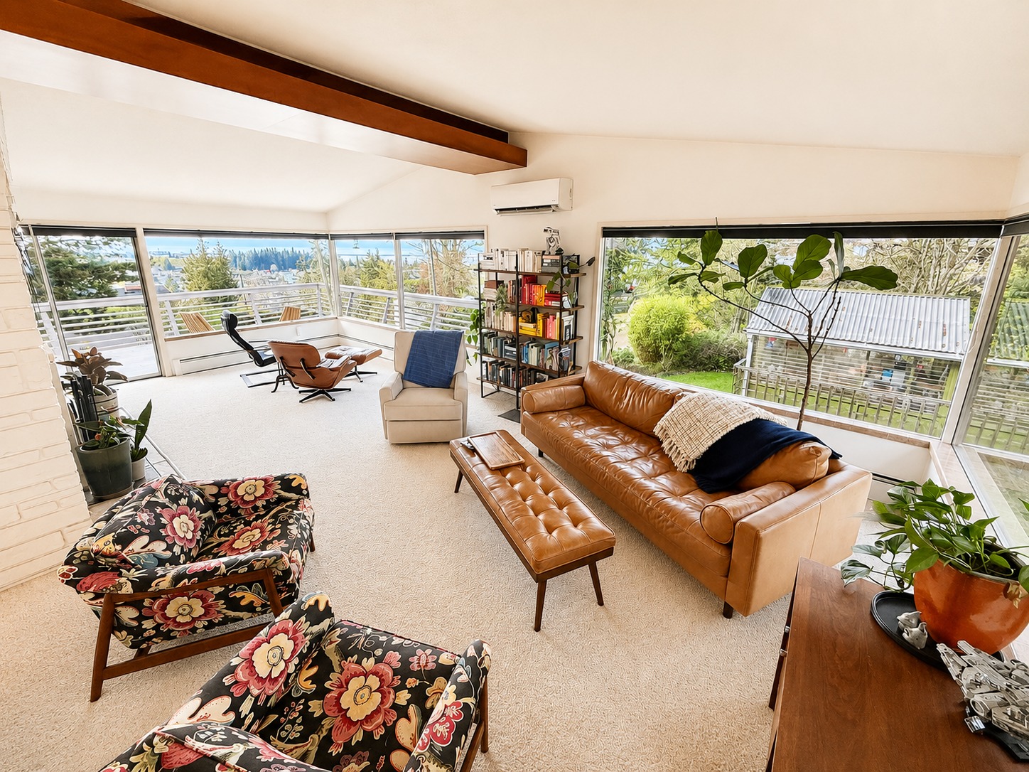 Living room, vaulted ceiling and window wall